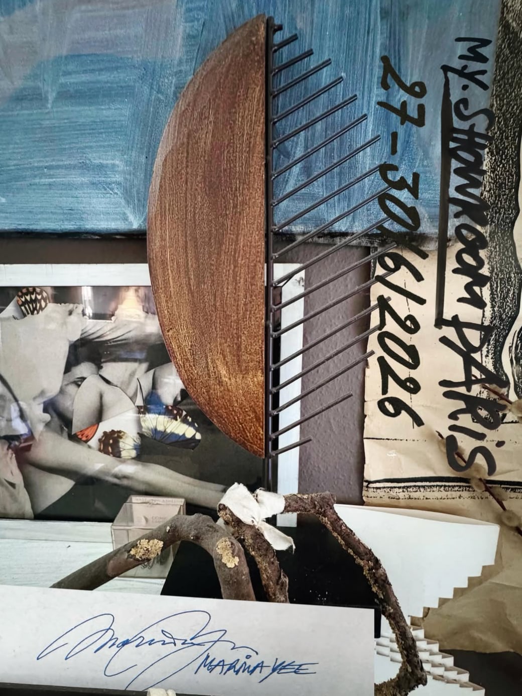 A showroom invitation collaged from photographs and paper, the dates written down one side by hand and signed at the foot.
